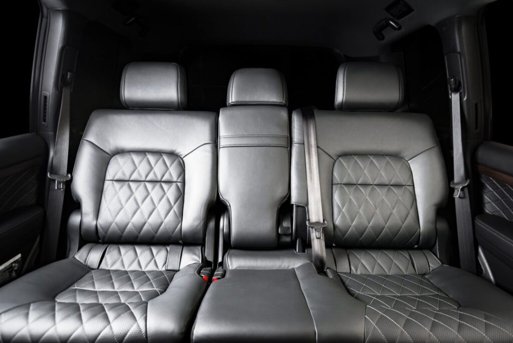 back-seats-of-modern-luxury-car-interior-black-leather.jpg